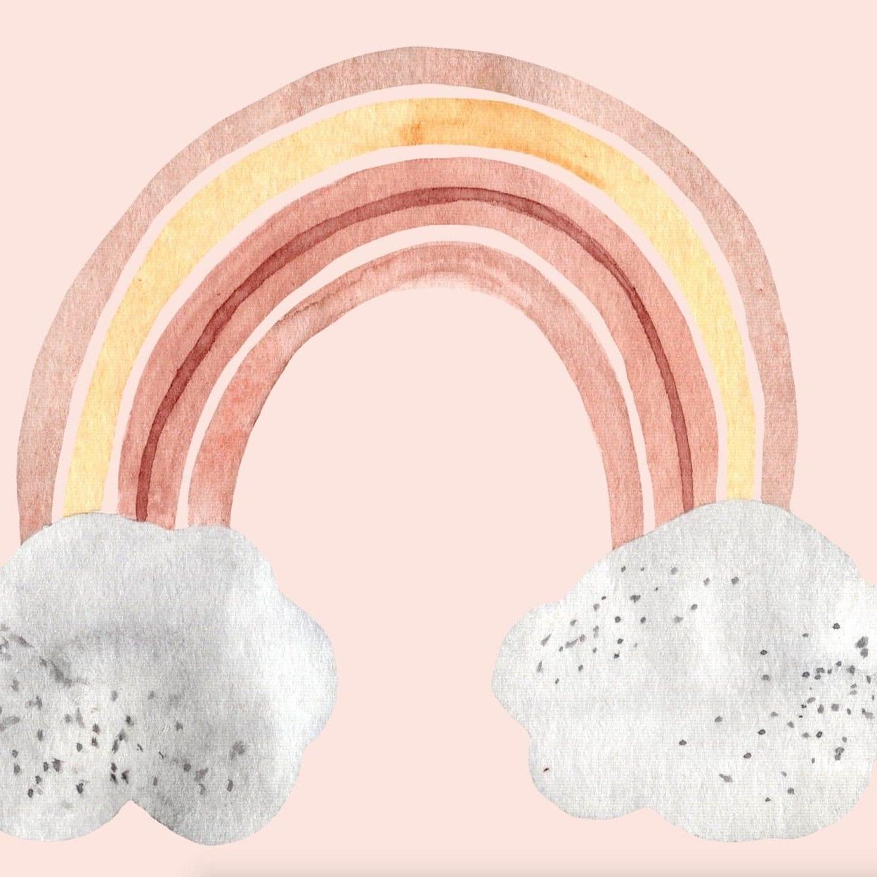 Wall Blush's Eden's Rainbows Wallpaper in a nursery, with whimsical pastel rainbow design.