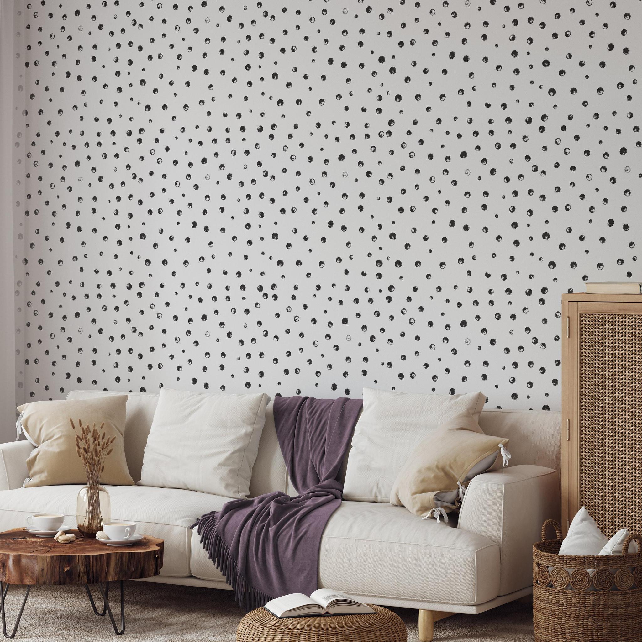 Chic living room featuring The MB Line's PERIOD. Wallpaper with elegant black dots design.