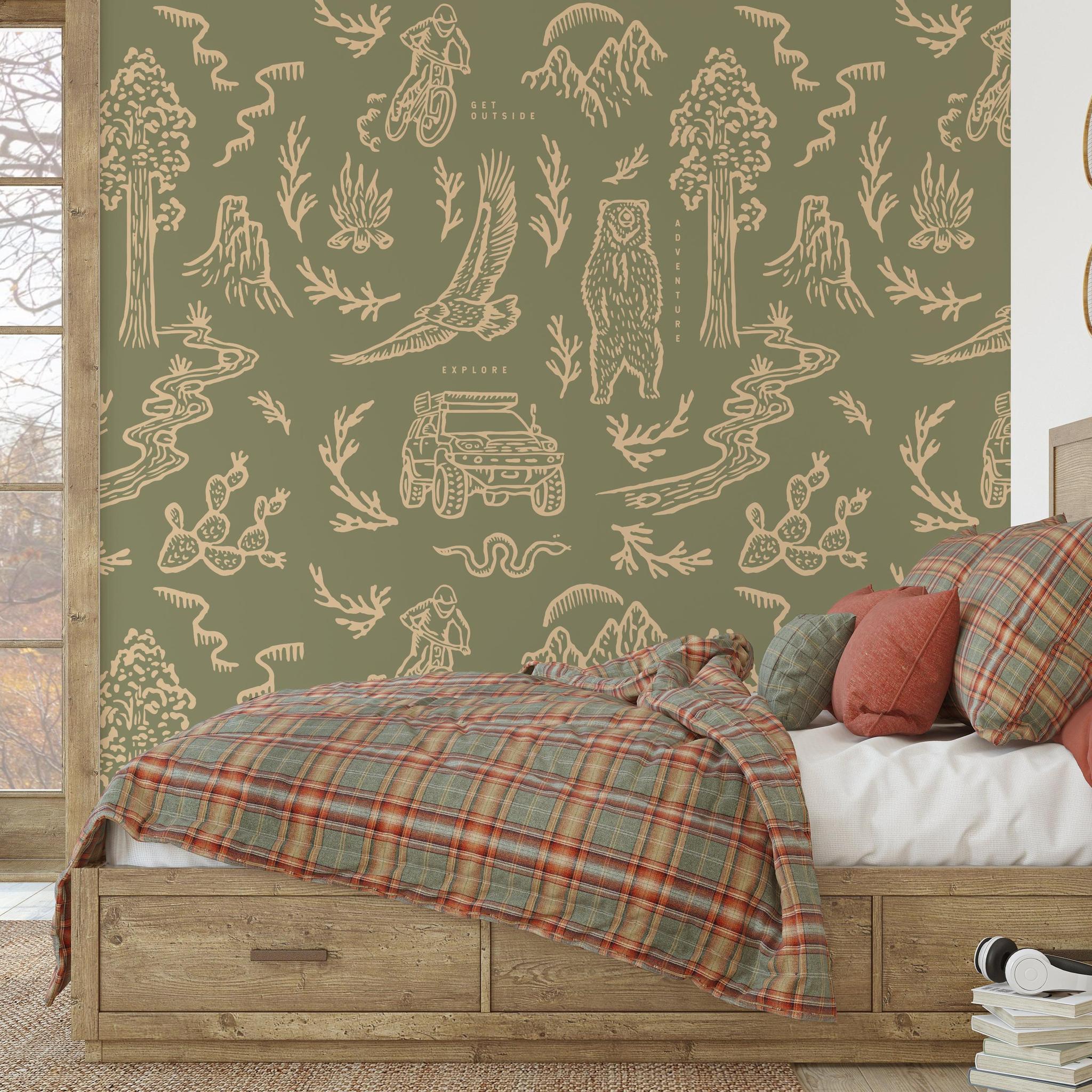 Cozy bedroom featuring The Rayco Line Adventure Awaits (Green) Wallpaper with rustic decor.