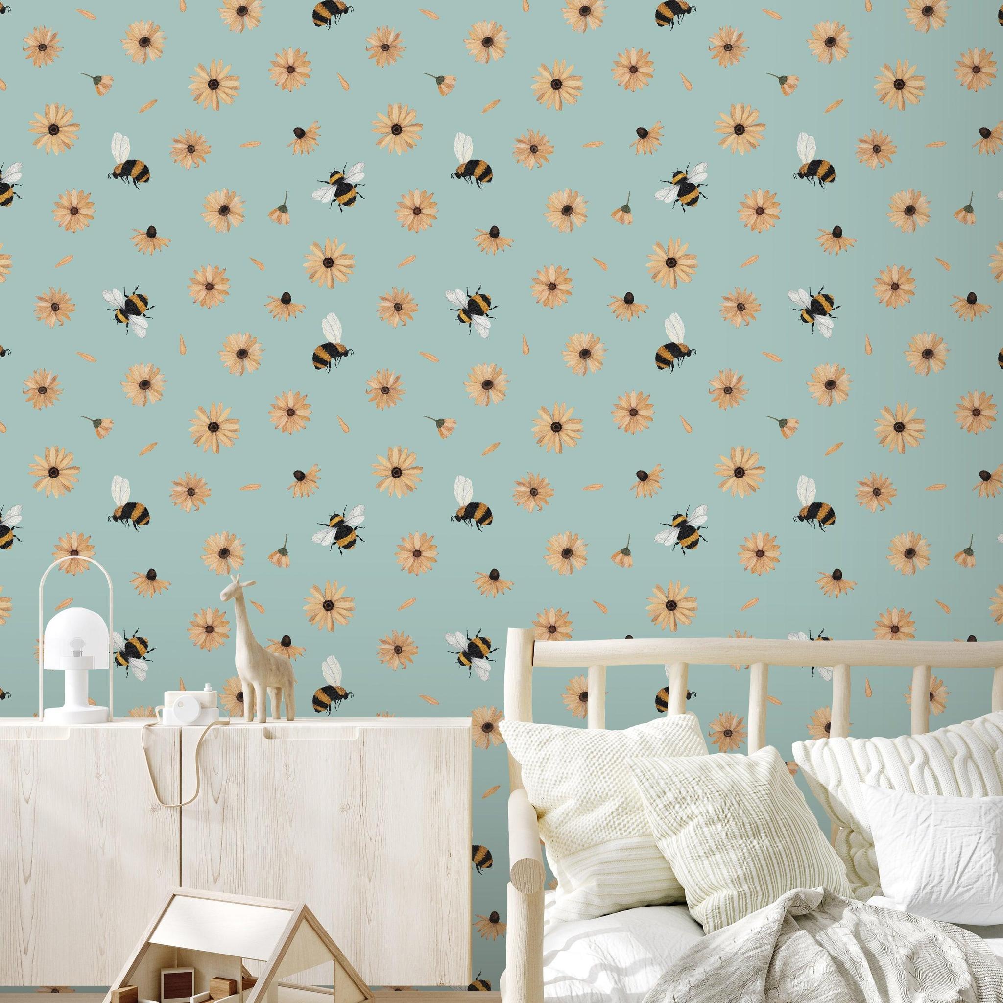 Bumble (Blue) Wallpaper by Wall Blush in a cozy bedroom, highlighting the playful bee design.