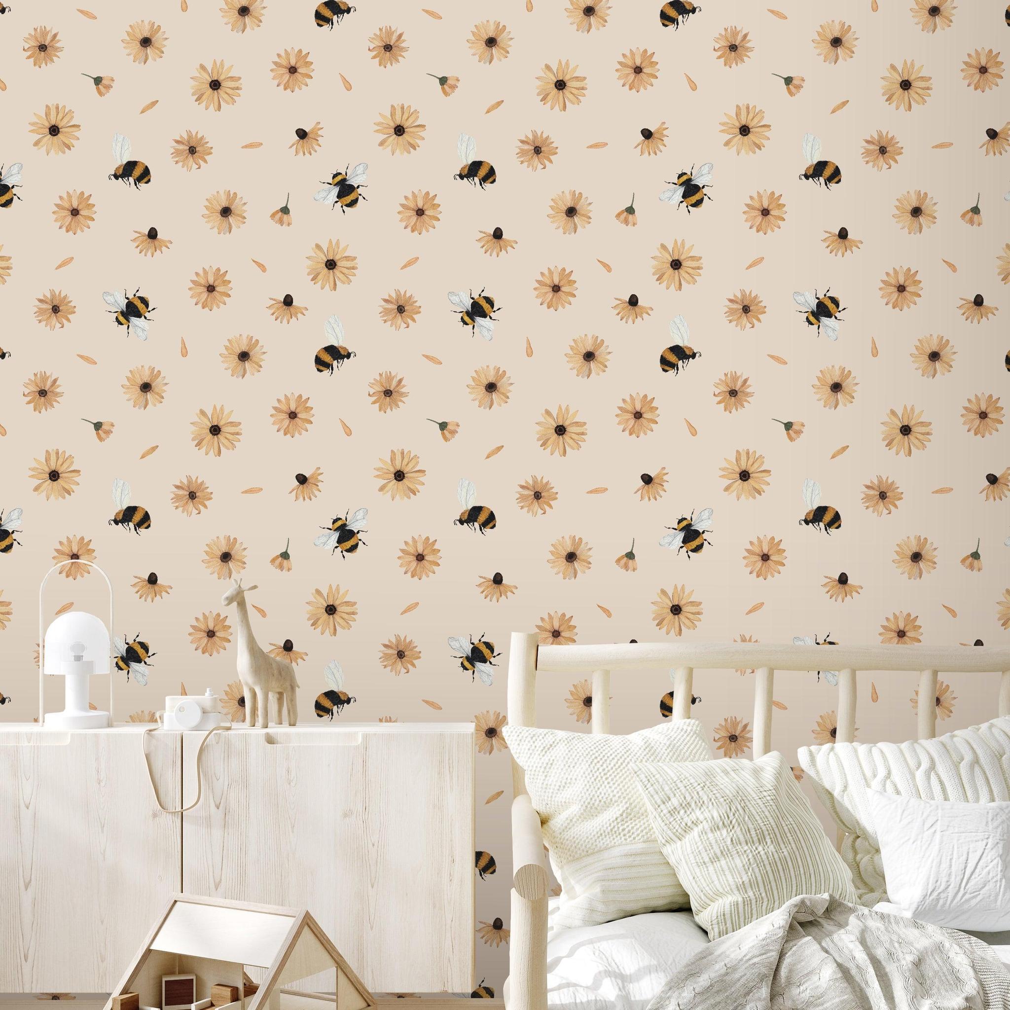 Bumble (Tan) Wallpaper by Wall Blush decorating a cozy bedroom, highlighting the warm and playful design.