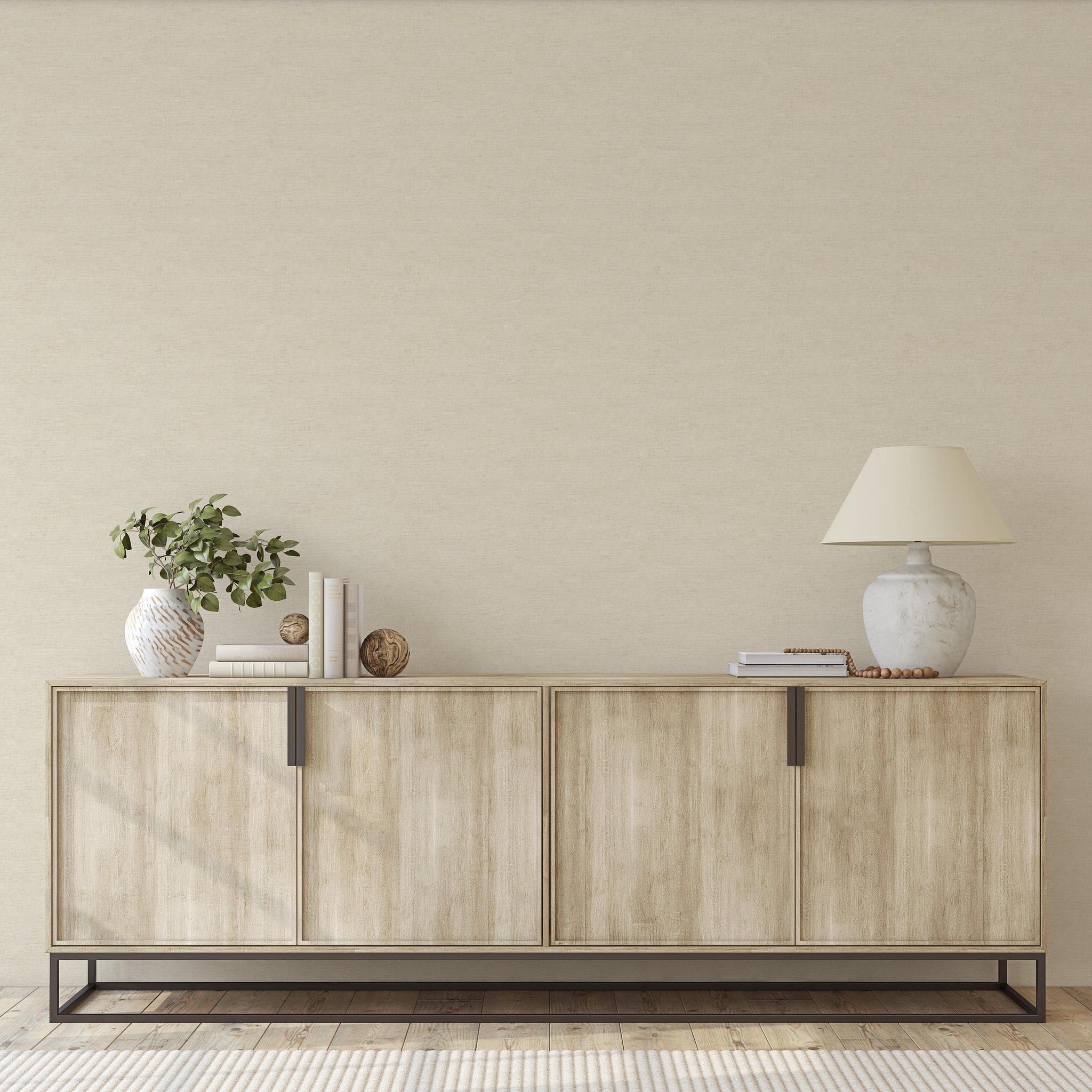 Carefree (Beige) Wallpaper by The Clements Crew Line in a modern living room, highlighting wall texture focus.