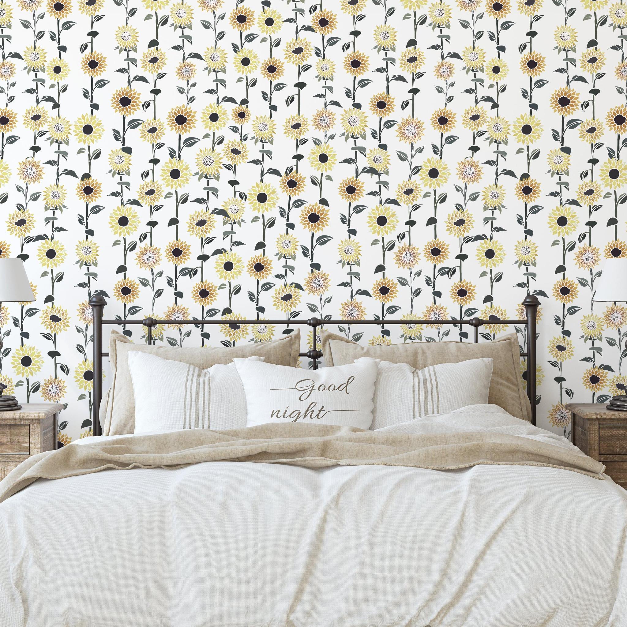 Cozy bedroom featuring Darla Wallpaper from The Chelsea DeBoer Line with floral design focus.