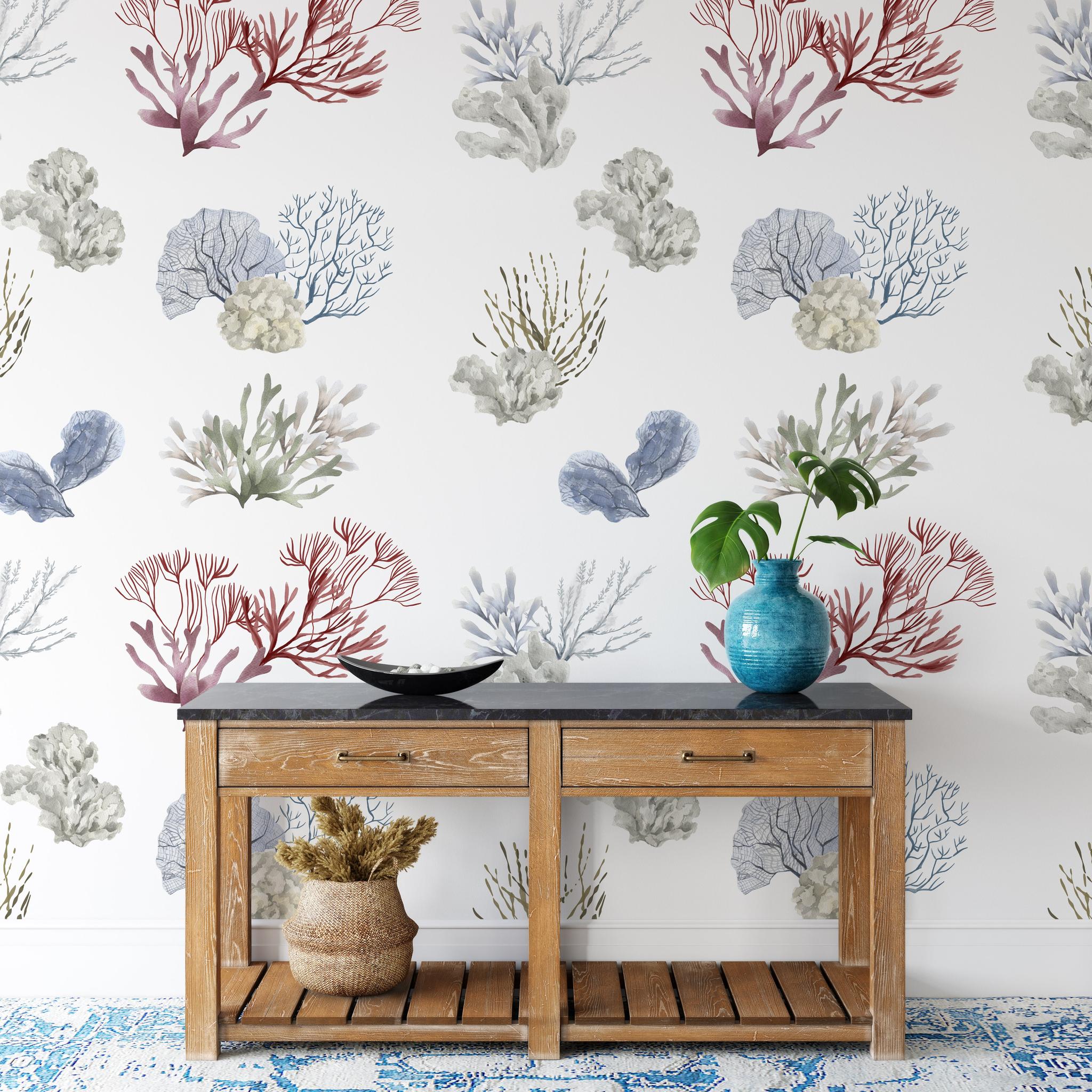 "Wall Blush Great Barrier Wallpaper adorning the walls of a stylish, coastal-themed entryway room."