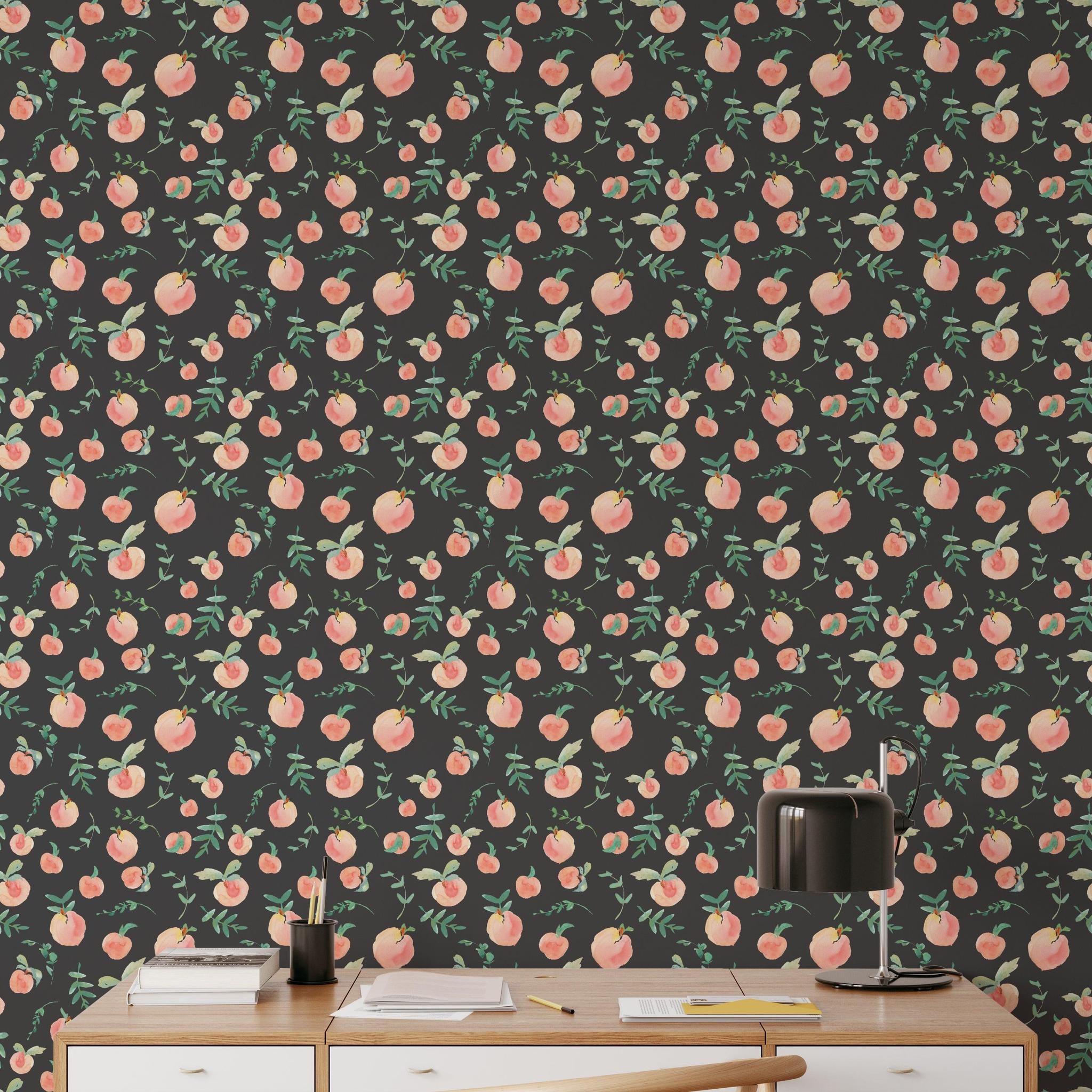 Alt: Wall Blush's Peachy Clean (Black) Wallpaper in a modern home office, creating a vibrant and stylish backdrop.