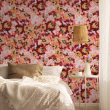 "Miraflores Wallpaper by Wall Blush featured in a cozy bedroom decor with prominent floral patterns."