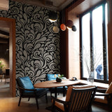 "Modern dining room featuring Wall Blush's Flowers of Jade Wallpaper, with stylish seating and pendant lights."