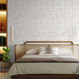 "Stylish Wall Blush Ada Wallpaper in a modern bedroom emphasizing the chic, abstract pattern."