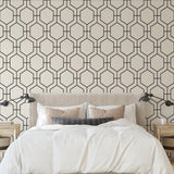 Modern Love Affair Wallpaper by The Tamra Judge Line accentuates bedroom walls, enhancing cozy and stylish decor.
