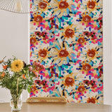 "Vibrant El Sol Wallpaper by Wall Blush in stylish dining room, showcasing colorful floral pattern as focal point."