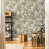 "The Kaycee Wallpaper by Wall Blush in a styled living room, floral pattern focus, cozy home decor"