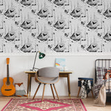 "Cabin Cove Wallpaper by Wall Blush in a stylish home office setup, with focus on the patterned wall decor."