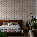 "Desert Cove Wallpaper by Wall Blush featured in a cozy, stylish bedroom focused on the elegant wall pattern."