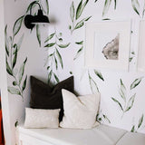 "Fiona Wallpaper by Wall Blush in a cozy living room focusing on botanical patterns."