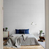 "Modern bedroom featuring Wall Blush's Oliver Wallpaper design with a minimalist herringbone pattern."