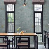 "Elegant Kinsbeth Wallpaper by Wall Blush in a stylish dining room interior, highlighting the floral design."