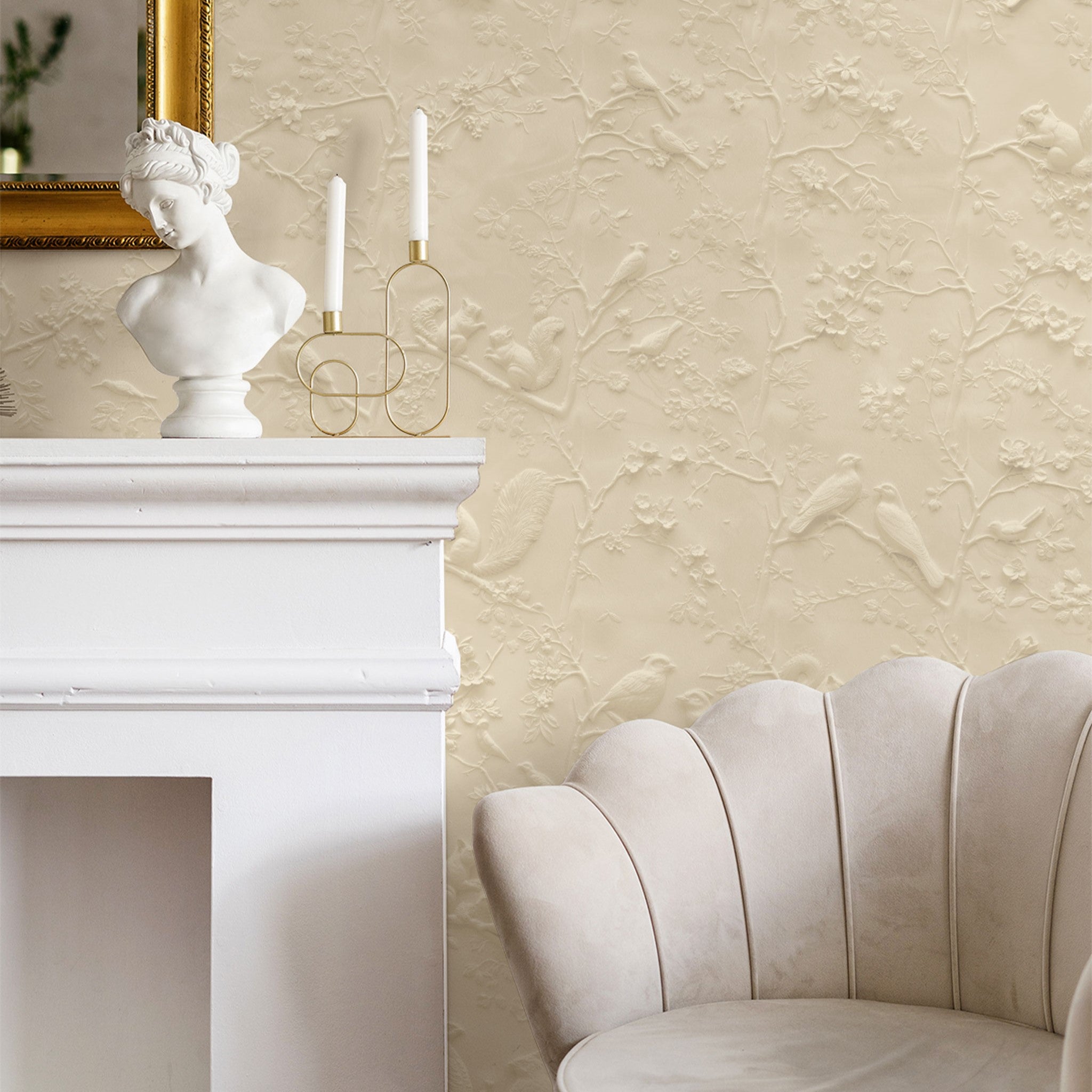 Elegant Wall Blush Ivory Wallpaper in a Living Room with Plush Sofa and Mantelpiece Decor.