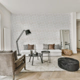 "Modern living room featuring Wall Blush's Ada Wallpaper, highlighting its elegant pattern and design."