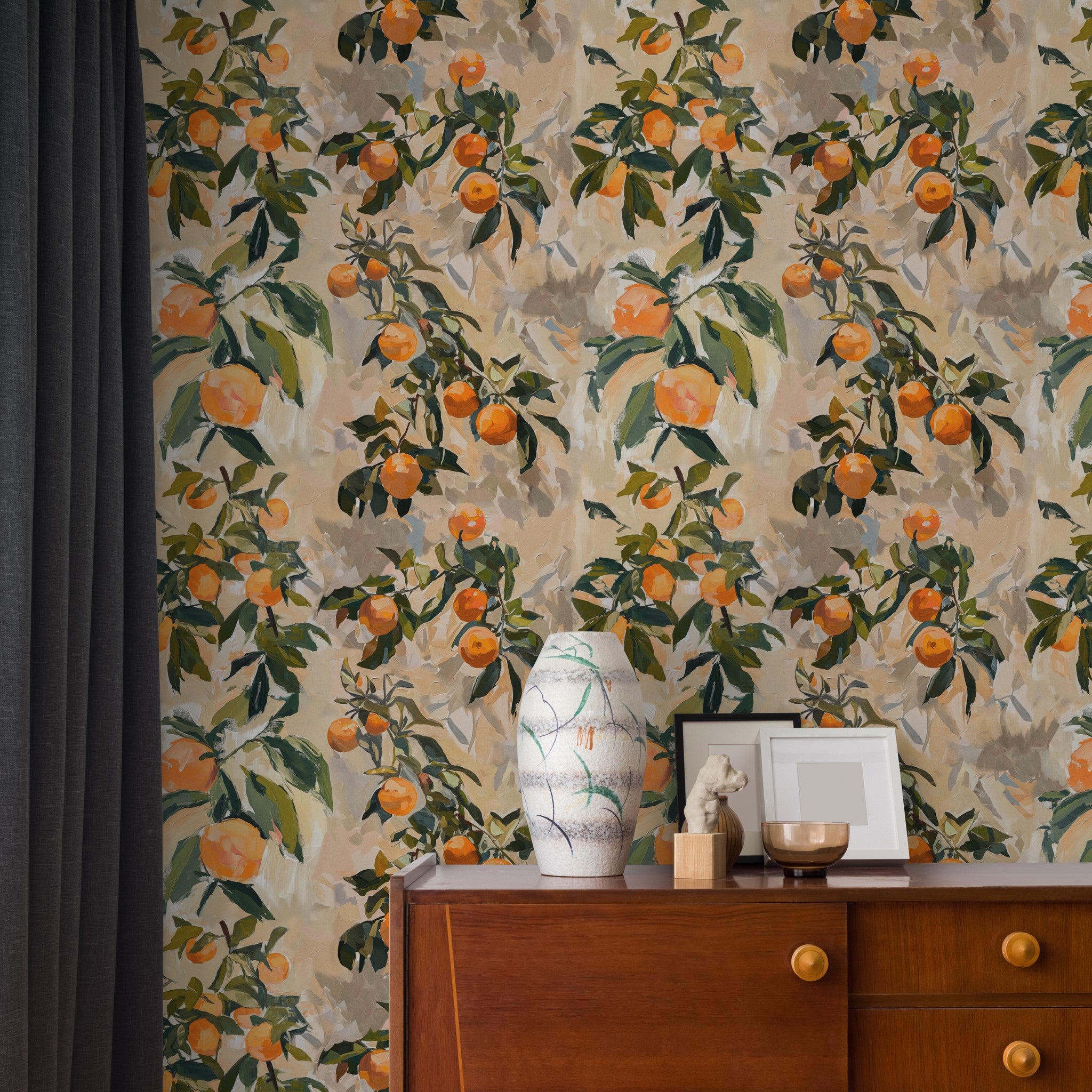 "Clementine Wallpaper by Wall Blush adorns living room wall, adding vibrant citrus-themed decor focus."