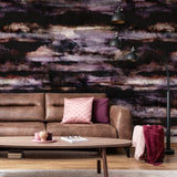 "Elegant Eclipse Wallpaper by Wall Blush enhancing cozy living room decor with stylish sofa and modern lighting."