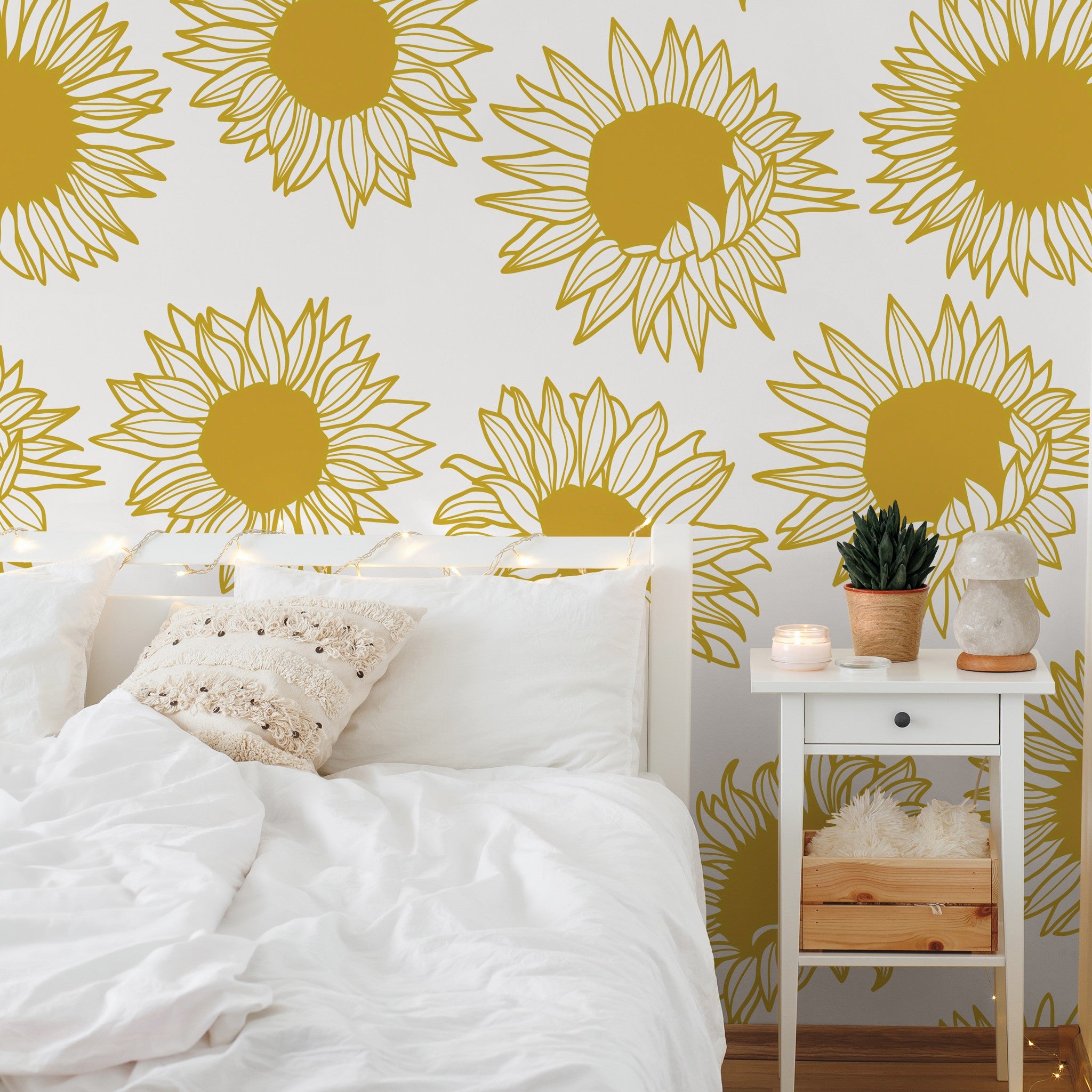 "Penelope Wallpaper by Wall Blush adorning a cozy bedroom, with a focus on the vibrant sunflower design."