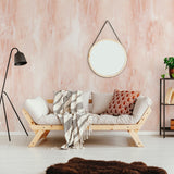 Wall Blush's Coral Cascades Wallpaper featured in cozy, modern living room setting, accentuating warm tones.
