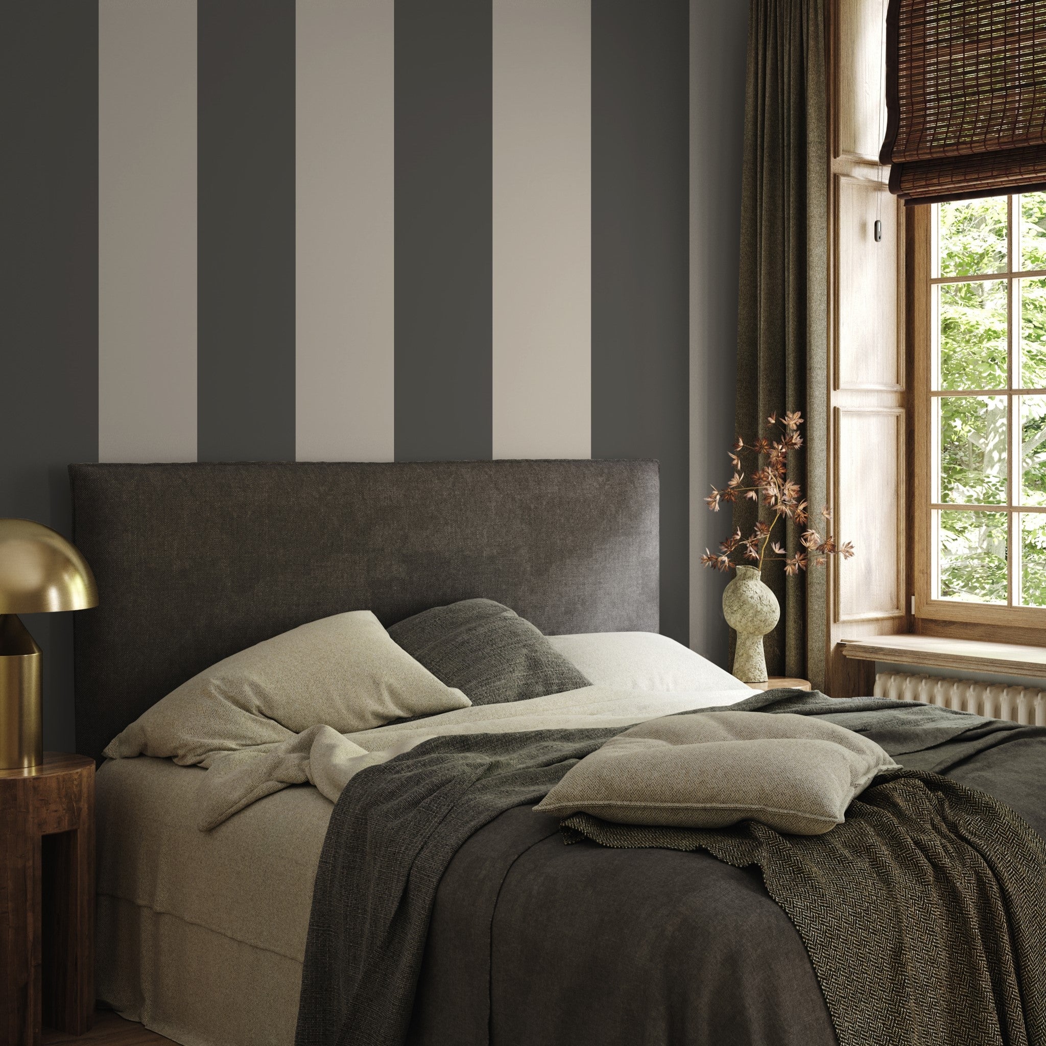 Alt text: "Elegant bedroom featuring Wall Blush Aldo Wallpaper with striking grey stripes, creating a modern and cozy atmosphere."