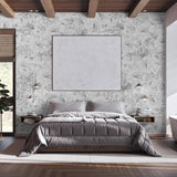 "Wall Blush's Juliet Wallpaper in a modern bedroom showcasing elegant floral design with a focus on the wallpaper."
