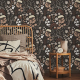 Wall Blush Mushy (Charcoal) Wallpaper in cozy bedroom, modern floral design focus.