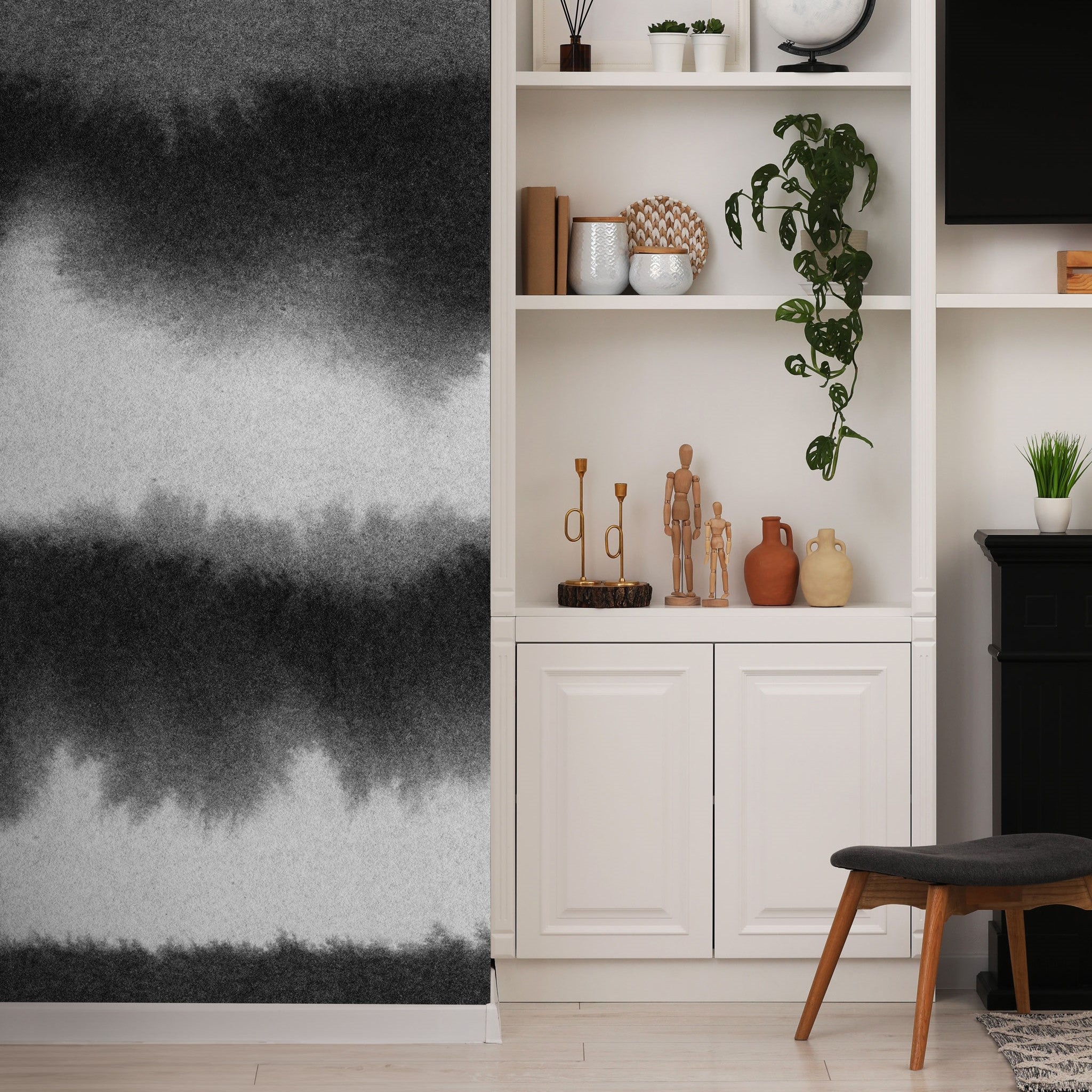 "Wall Blush Power Couple Wallpaper in stylish living room setting, with focus on the elegant black and white design."