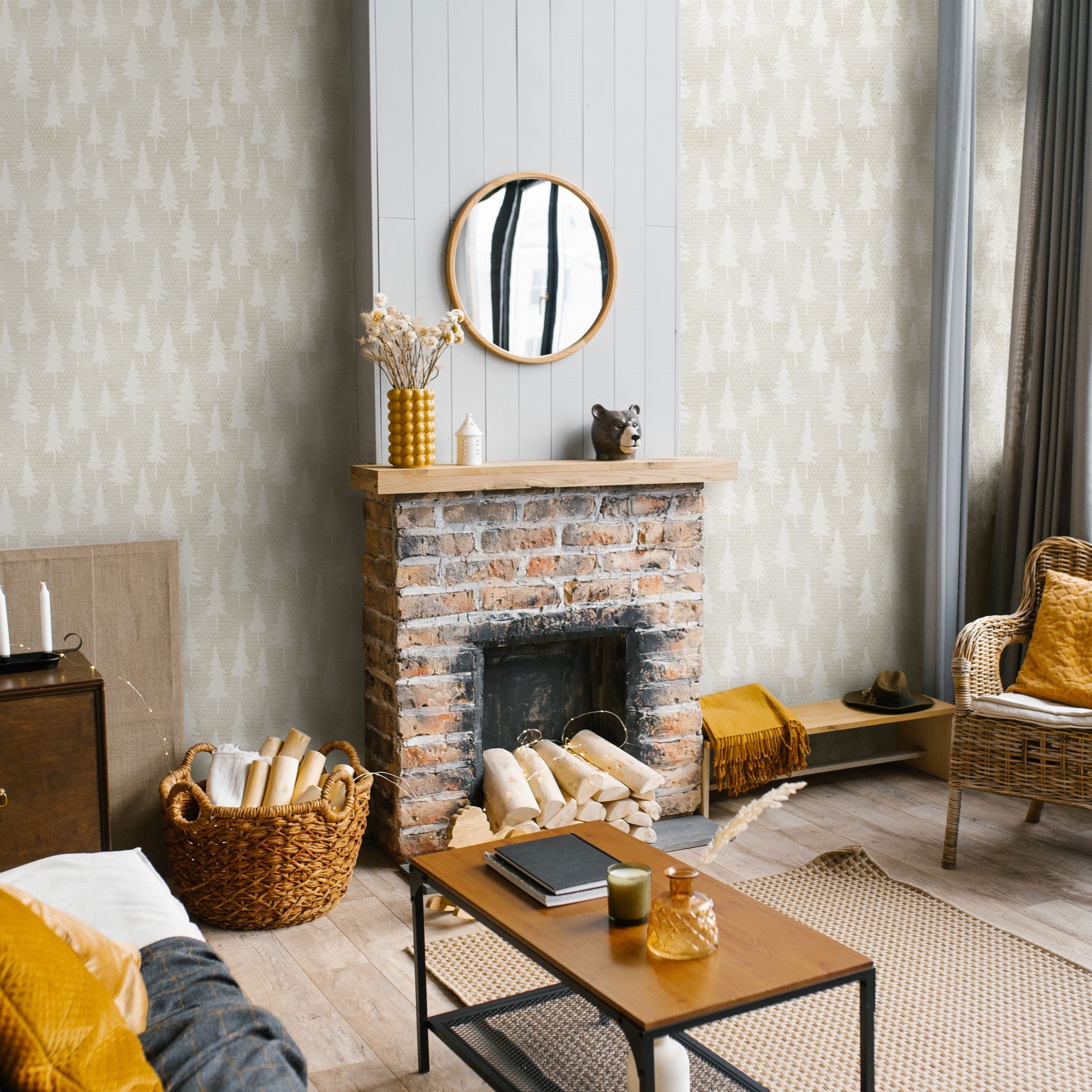 "Wonderland Wallpaper by Wall Blush enhancing a cozy living room with a brick fireplace and chic decor."