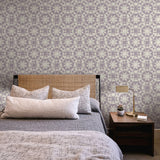 "Modern bedroom featuring Wall Blush's Pascal Wallpaper design with stylish decor and cozy bedding."