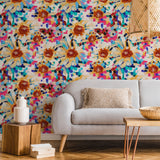 "El Sol Wallpaper by Wall Blush in a cozy living room setting with a focus on the vibrant wall pattern."