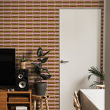 "Wall Blush's 30 and Flirty Wallpaper featured in stylish living room, enhancing modern home decor focus."
