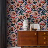 "Wall Blush's Rosaleda Wallpaper featured in a stylish living room, adding vibrant floral elegance to home decor."