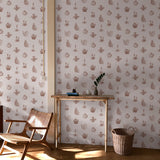 "Wall Blush's Desert Cove Wallpaper featured in a sunlit home office space, showcasing the elegant pattern."