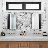 "Wall Blush's Juliet (Dark) Wallpaper featured in a stylish modern bathroom interior with floral design."