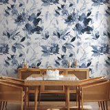 "Wall Blush Wild Blues Wallpaper featured in an elegant dining room, accentuating the decor."