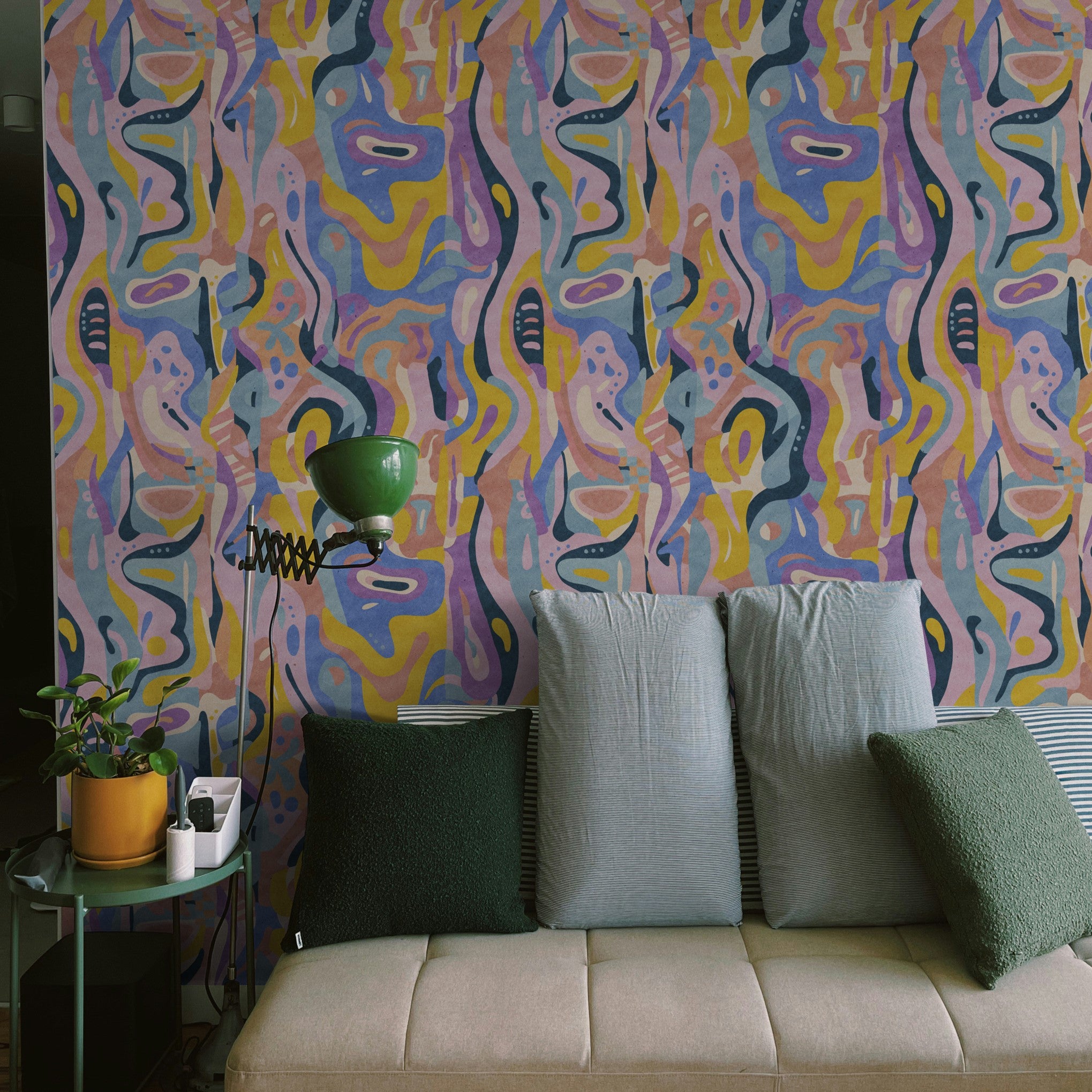"Funky Town Wallpaper by Wall Blush in a cozy living room, accentuating vibrant wall decor focus."