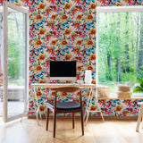"El Sol Wallpaper by Wall Blush in modern home office with vibrant floral design, making the wall stand out."
