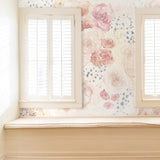 "Wall Blush Pastel Posey Wallpaper enhancing a cozy living room's aesthetics"