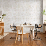 "Wall Blush's Ada Wallpaper featured in a stylish dining room setup, highlighting the patterned wall decor."