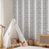 "Ar-row Wallpaper by Wall Blush in a stylish kids' room with a tent and toys, highlighting the modern wall decor."