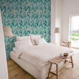 "Kawaii Wallpaper by Wall Blush in a stylish bedroom, highlighting colorful bird and tree designs."