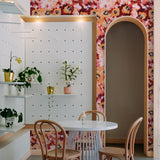 "Wall Blush's Miraflores Wallpaper enhancing modern dining area, showcasing vibrant design and elegant room decor."