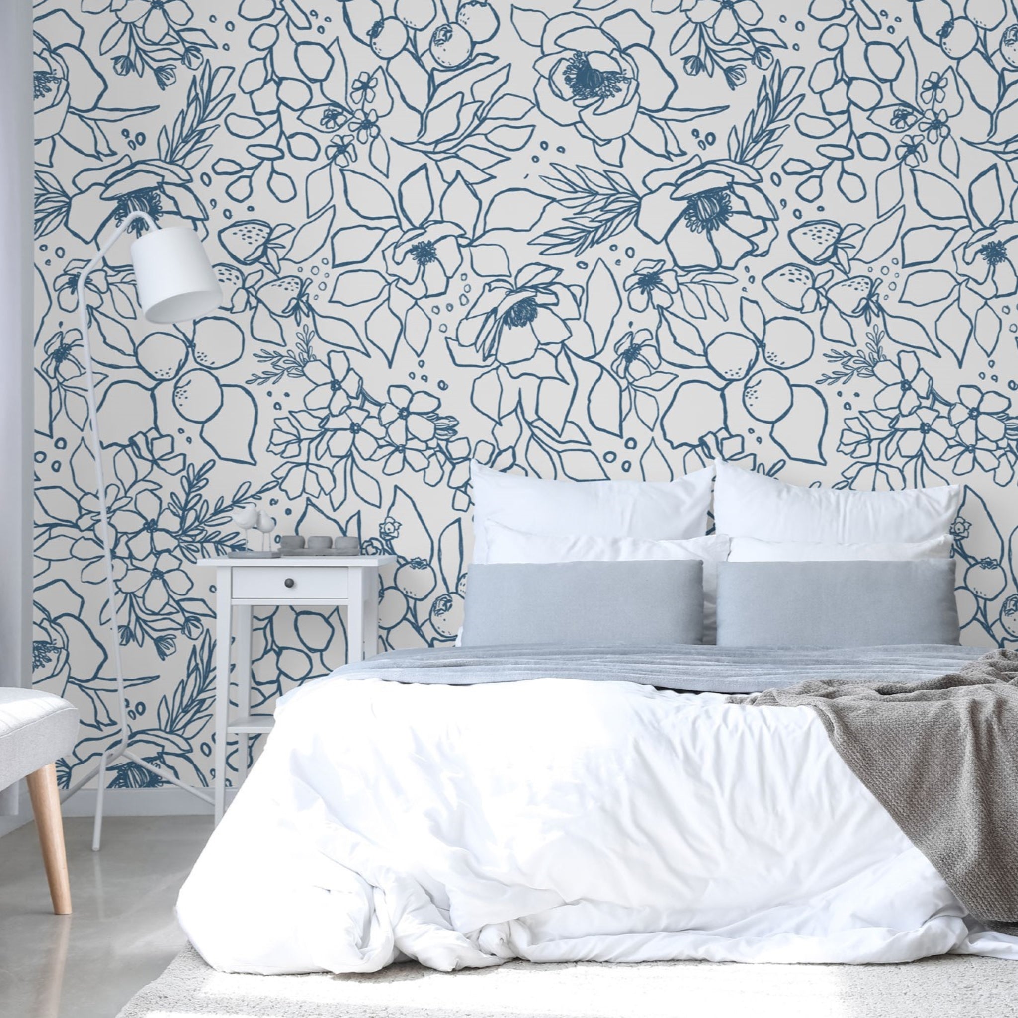 "Paige Wallpaper by Wall Blush featuring floral pattern in cozy bedroom setting, highlighting wall design focus."