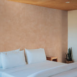 "Camila Wallpaper by Wall Blush in modern bedroom, earth-tone textured design spotlighting stylish home decor."