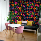 "Vibrant Imelda Wallpaper by Wall Blush in modern living room, colorful floral design on feature wall."