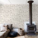 "Cozy living room featuring Wall Blush's Woodland (Cream) Wallpaper with whimsical animal patterns."