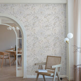 "Wall Blush Something Blue Wallpaper in a modern living room with a designer chair and lamp."